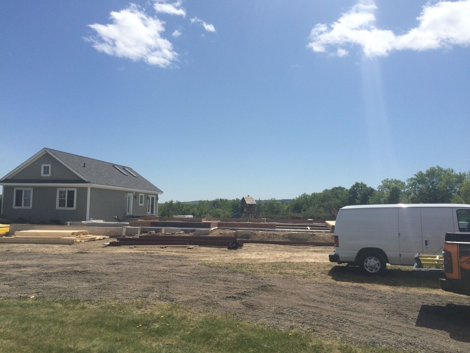 Structural framing photo used for the Rebuild The Planet homepage reel